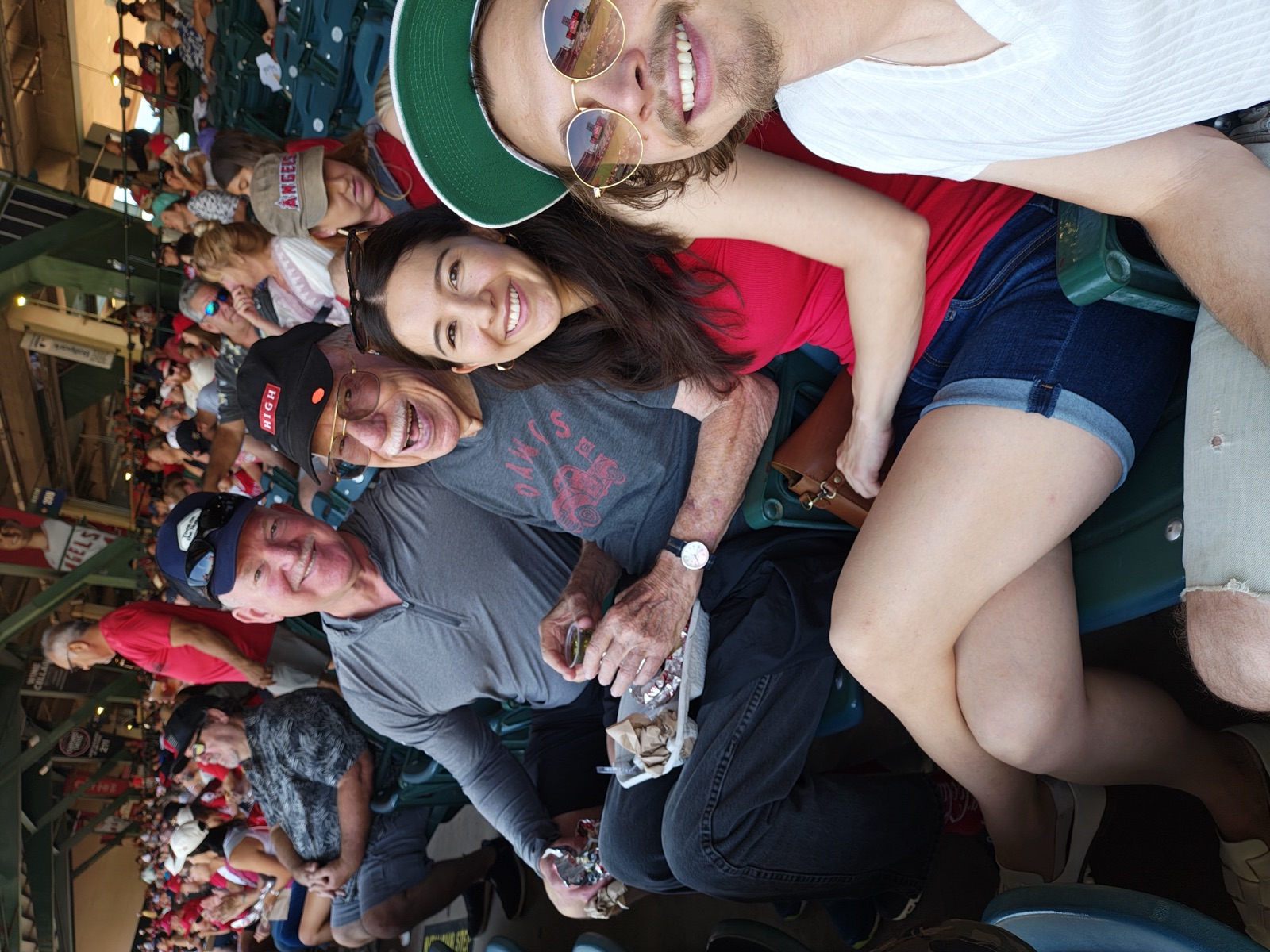 Cece, Logan, and Grandpa Ray at the Angels game