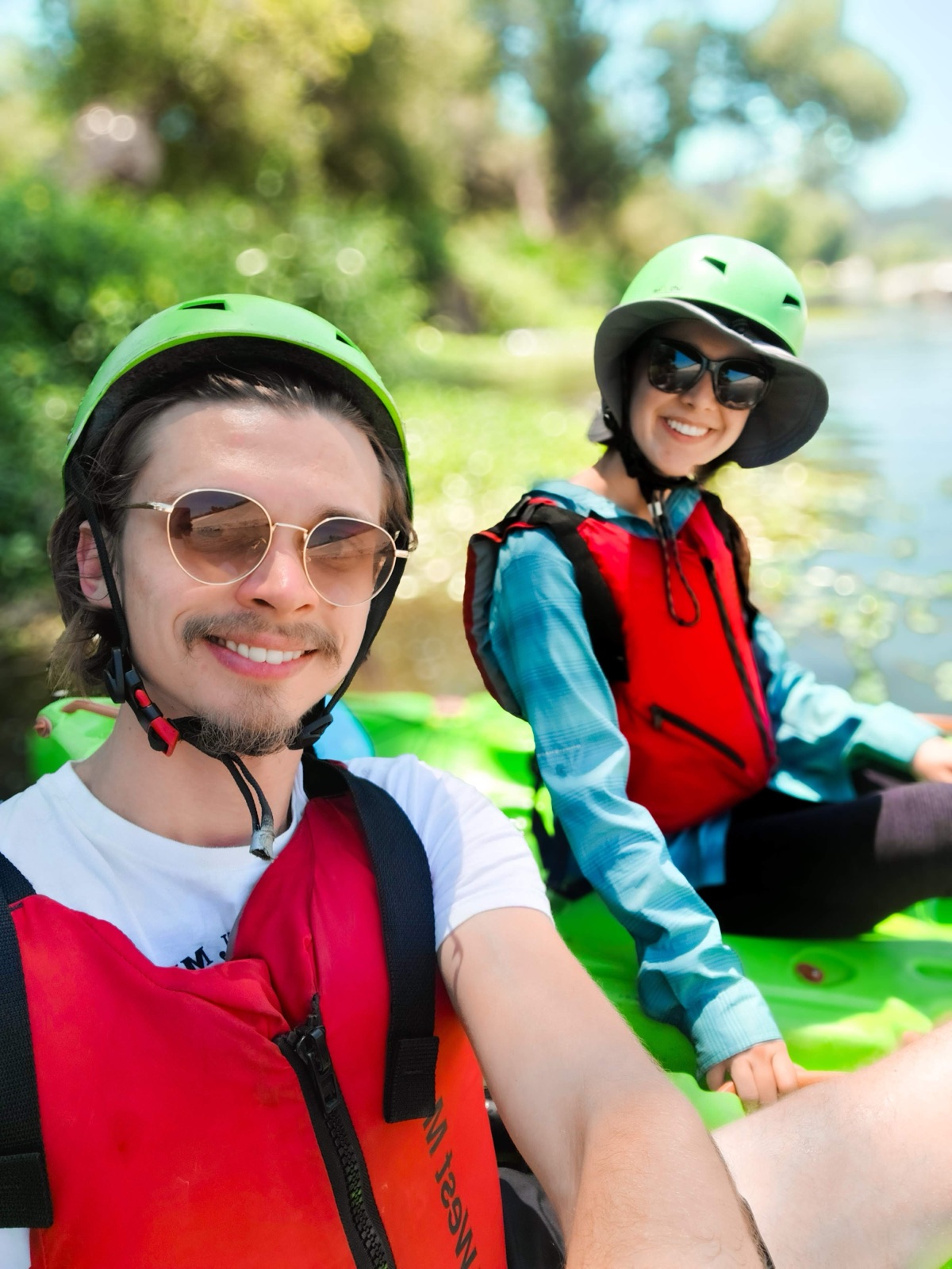 Cece and Logan kayaking on their first date
